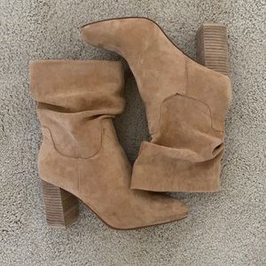 Lightly worn tan booties.